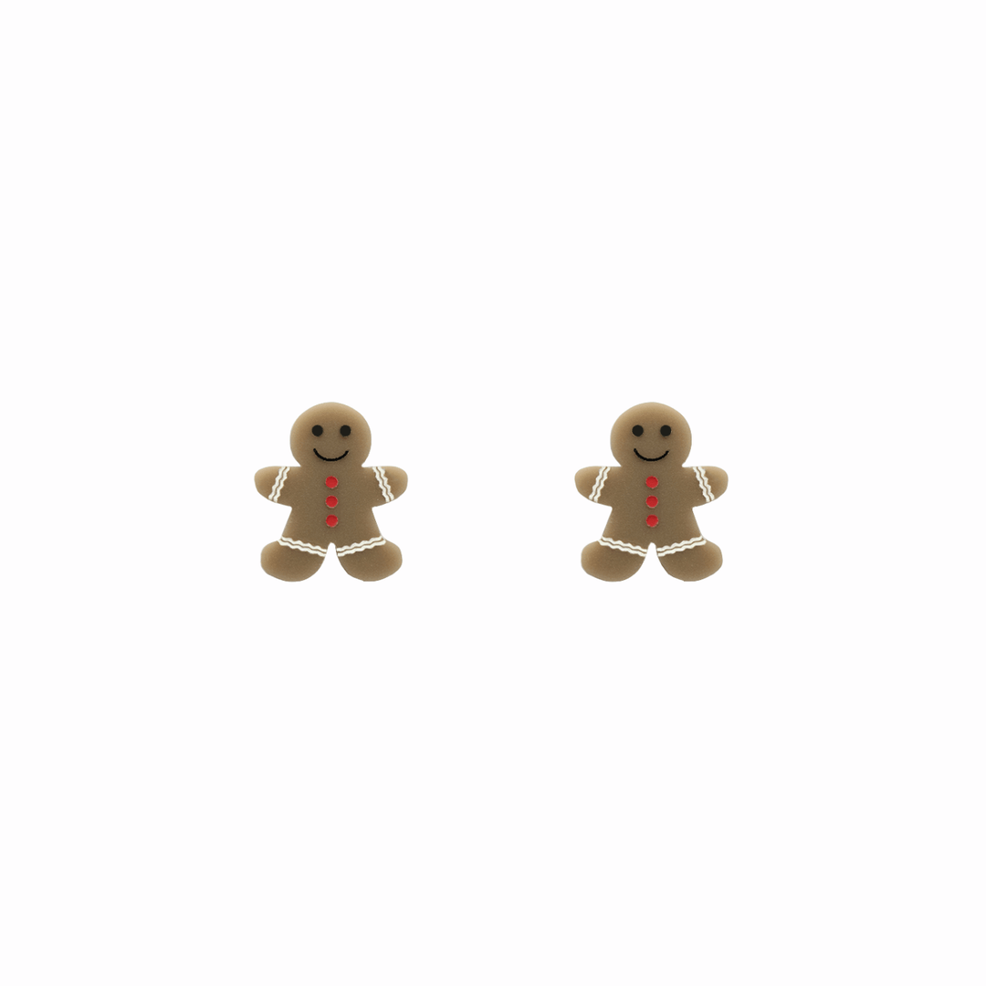 haus of dizzy gingerbread friend studs. light brown acrylic with hand-painted white, red and black detailing.