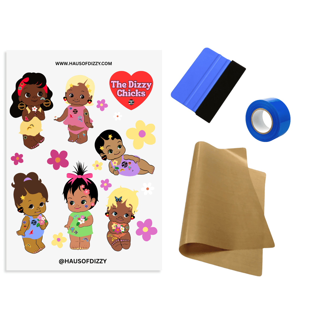 DIY Iron-On Transfer Kit by Haus of Dizzy, featuring a sheet of various Dizzy chick decals, a squeegee, blue heat-proof tape, and brown teflon paper included.