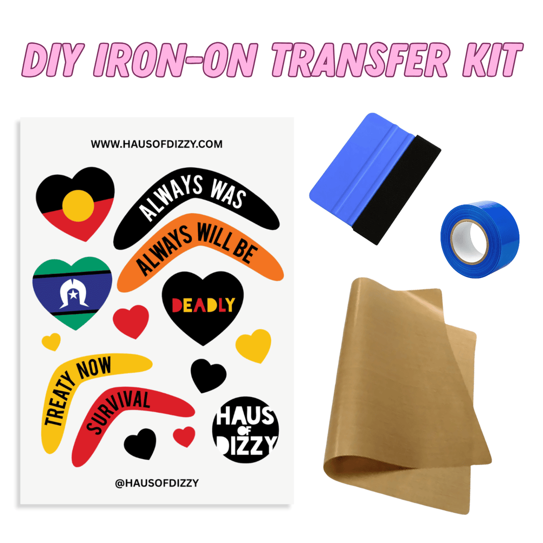DIY Iron-On Transfer Kit by Haus of Dizzy, featuring a sheet of various First nations pride decals, a squeegee, blue heat-proof tape, and brown teflon paper included.