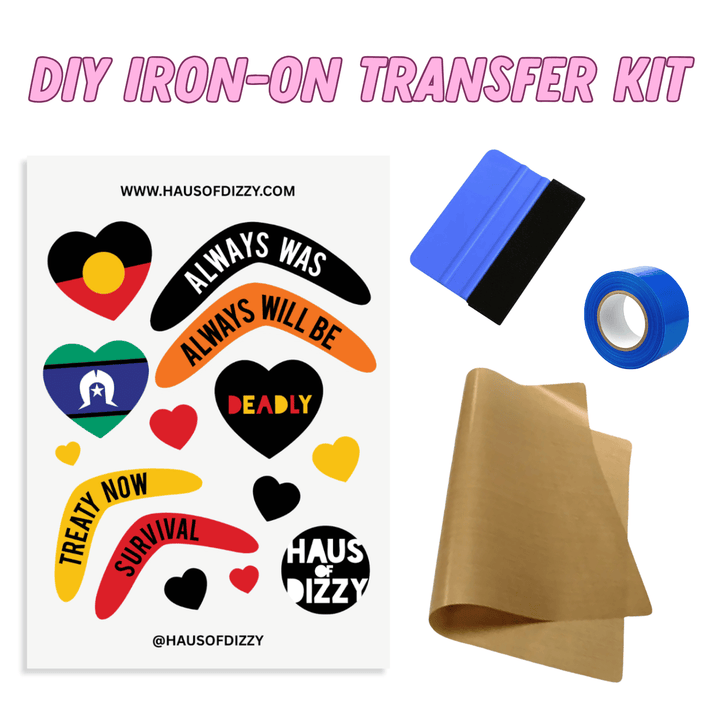 DIY Iron-On Transfer Kit by Haus of Dizzy, featuring a sheet of various First nations pride decals, a squeegee, blue heat-proof tape, and brown teflon paper included.
