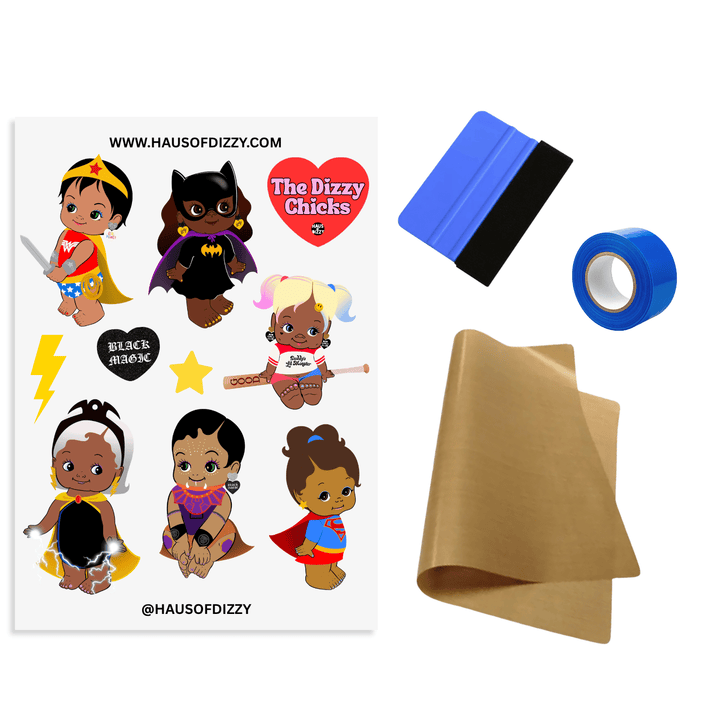 DIY Iron-On Transfer Kit by Haus of Dizzy, featuring a sheet of various super girl gang dizzy chicks decals, a squeegee, blue heat-proof tape, and brown teflon paper included.