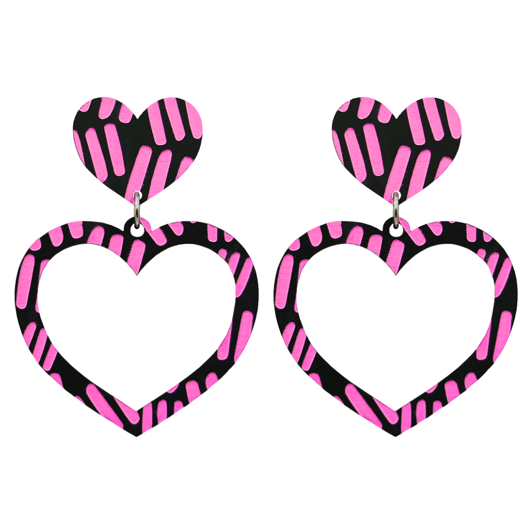 haus of dizzy black heart shaped dangle earrings with hand painted hot pink aboriginal line artwork size large