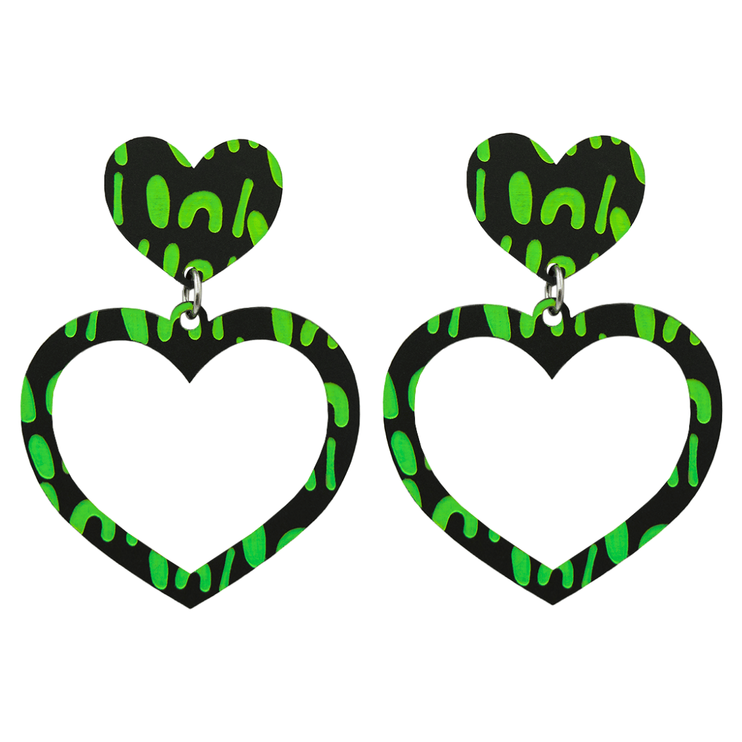 haus of dizzy black heart shaped dangle earrings with hand painted apple green aboriginal artwork depicting a woman with digging and coolamon sticks size large