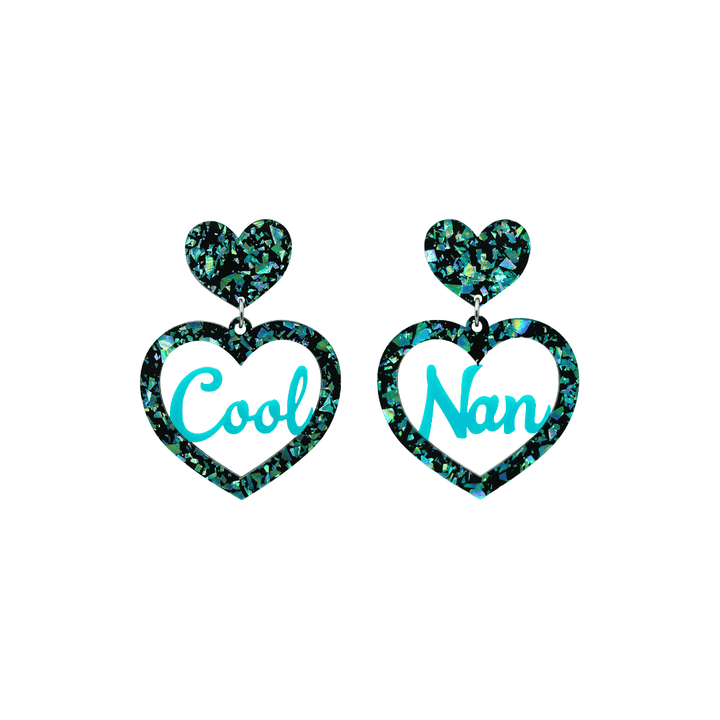 haus of dizzy chunky emerald glitter heart earrings with turquoise text that reads cool nan in cursive font size small