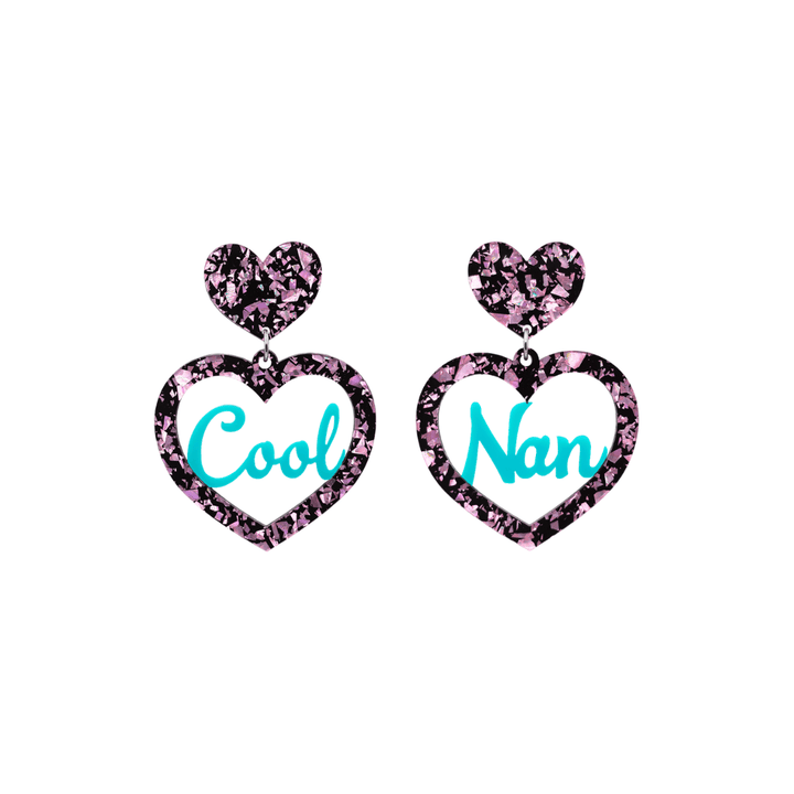 haus of dizzy chunky light pink glitter heart earrings with turquoise text that reads cool nan in cursive font size small