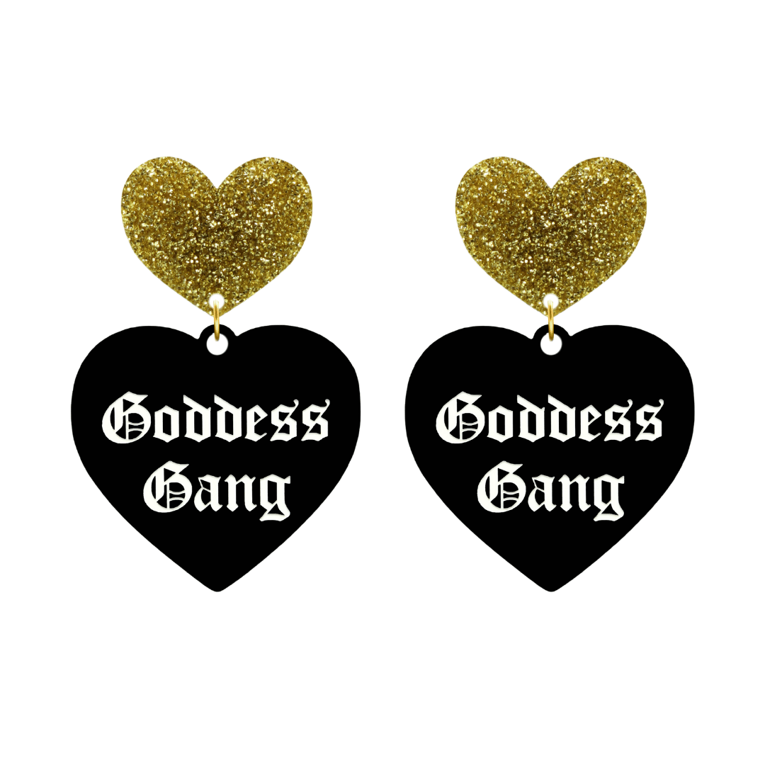 haus of dizzy black Heart-shaped earrings with 'Goddess Gang' text in white old english font with gold glittery hearts tops size large