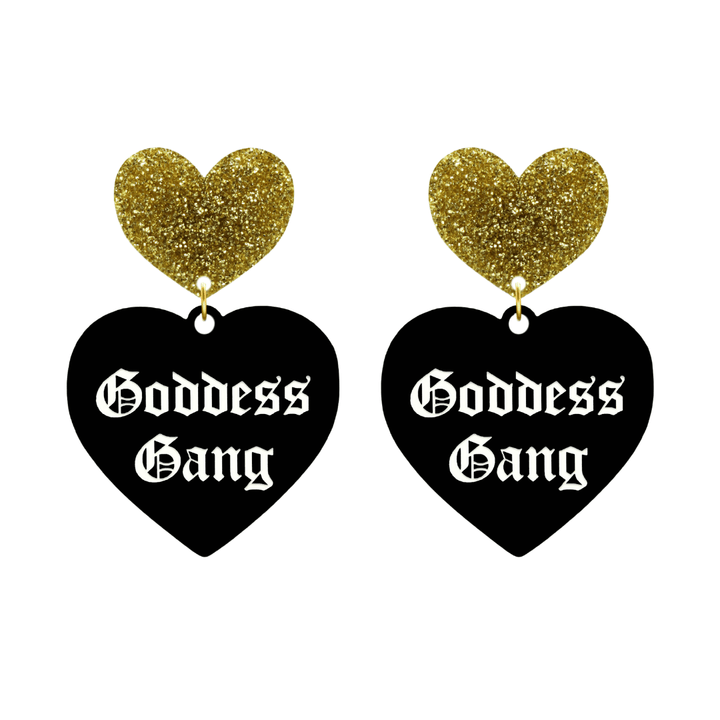 haus of dizzy black Heart-shaped earrings with 'Goddess Gang' text in white old english font with gold glittery hearts tops size large