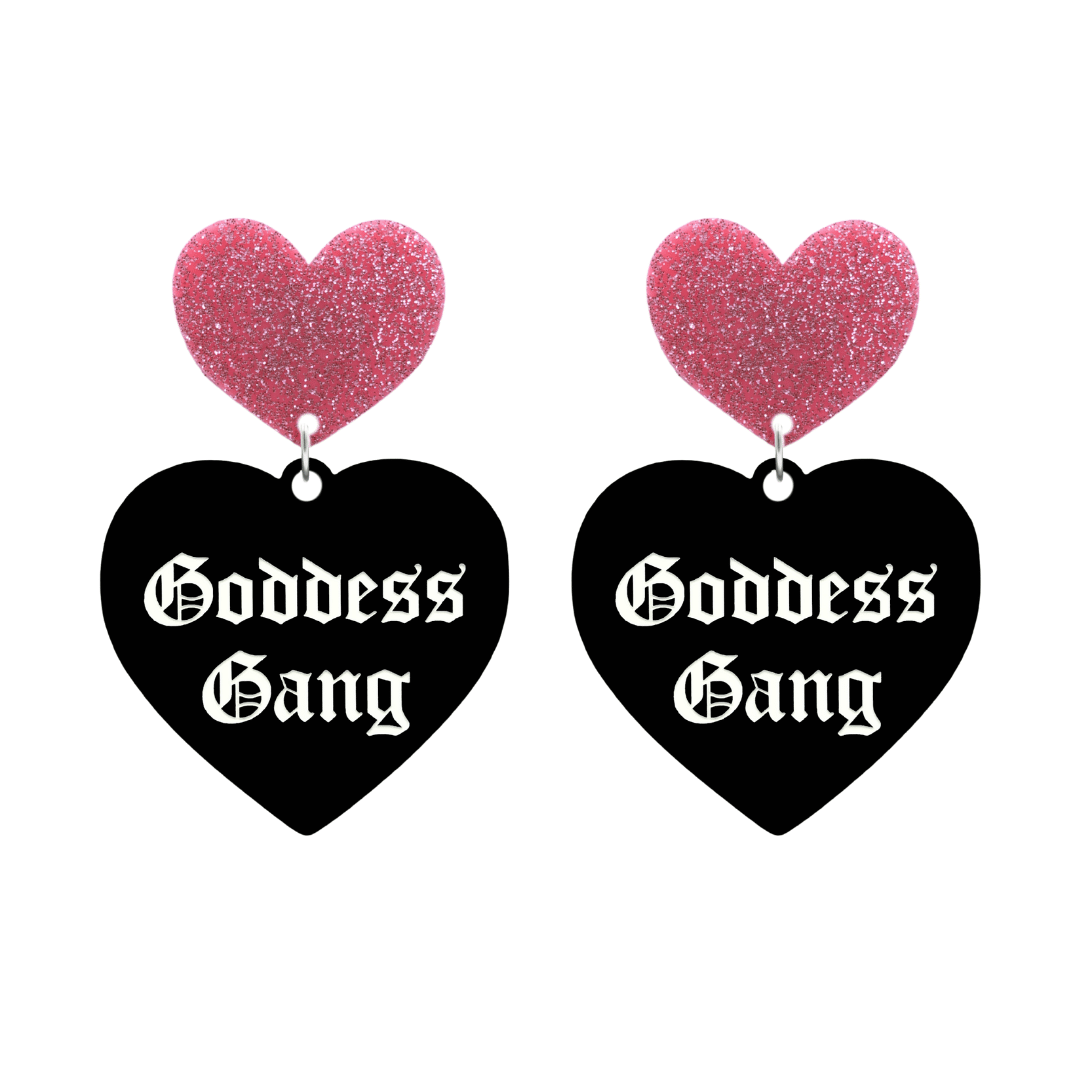 haus of dizzy black Heart-shaped earrings with 'Goddess Gang' text in white old english font with pink glittery hearts tops size large