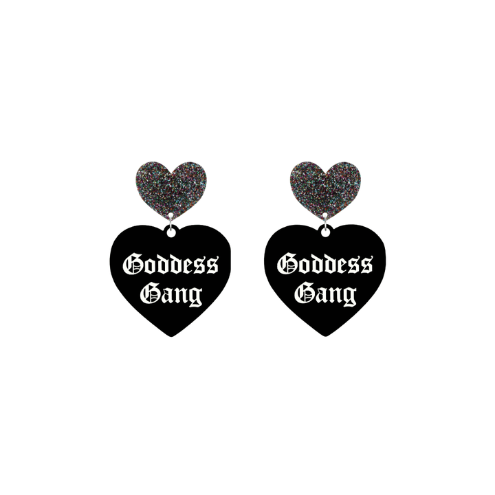 haus of dizzy black Heart-shaped earrings with 'Goddess Gang' text in white old english font with multi coloured glittery hearts tops size small