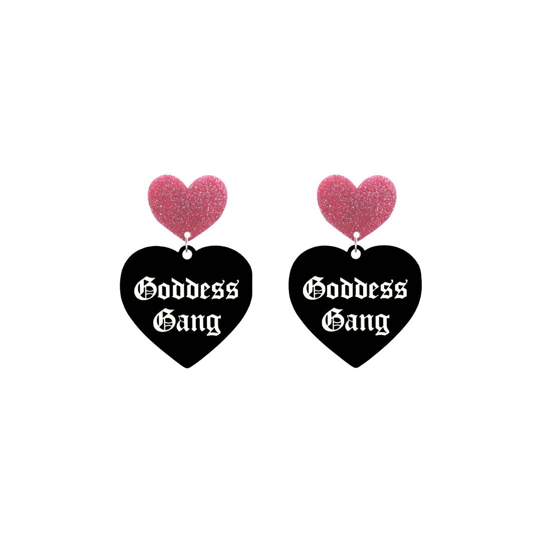 haus of dizzy black Heart-shaped earrings with 'Goddess Gang' text in white old english font with pink glittery hearts tops size small