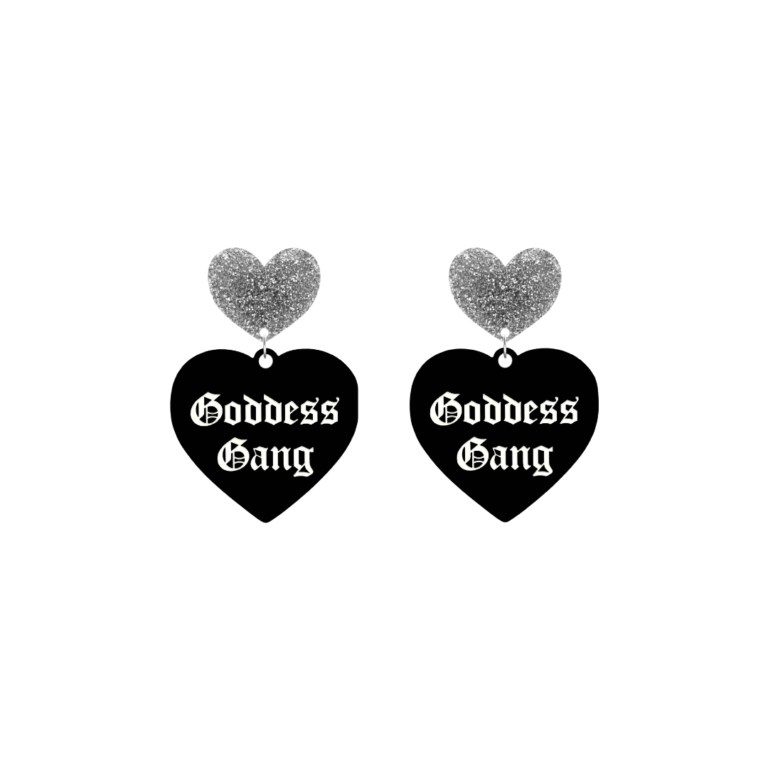 haus of dizzy black Heart-shaped earrings with 'Goddess Gang' text in white old english font with silver glittery hearts tops size small