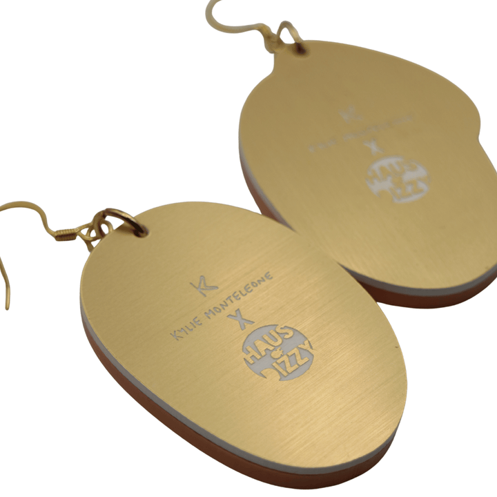 haus of dizzy x kylie monteleone collaboration ant nest earrings back view featuring custom etched design of artists' logos