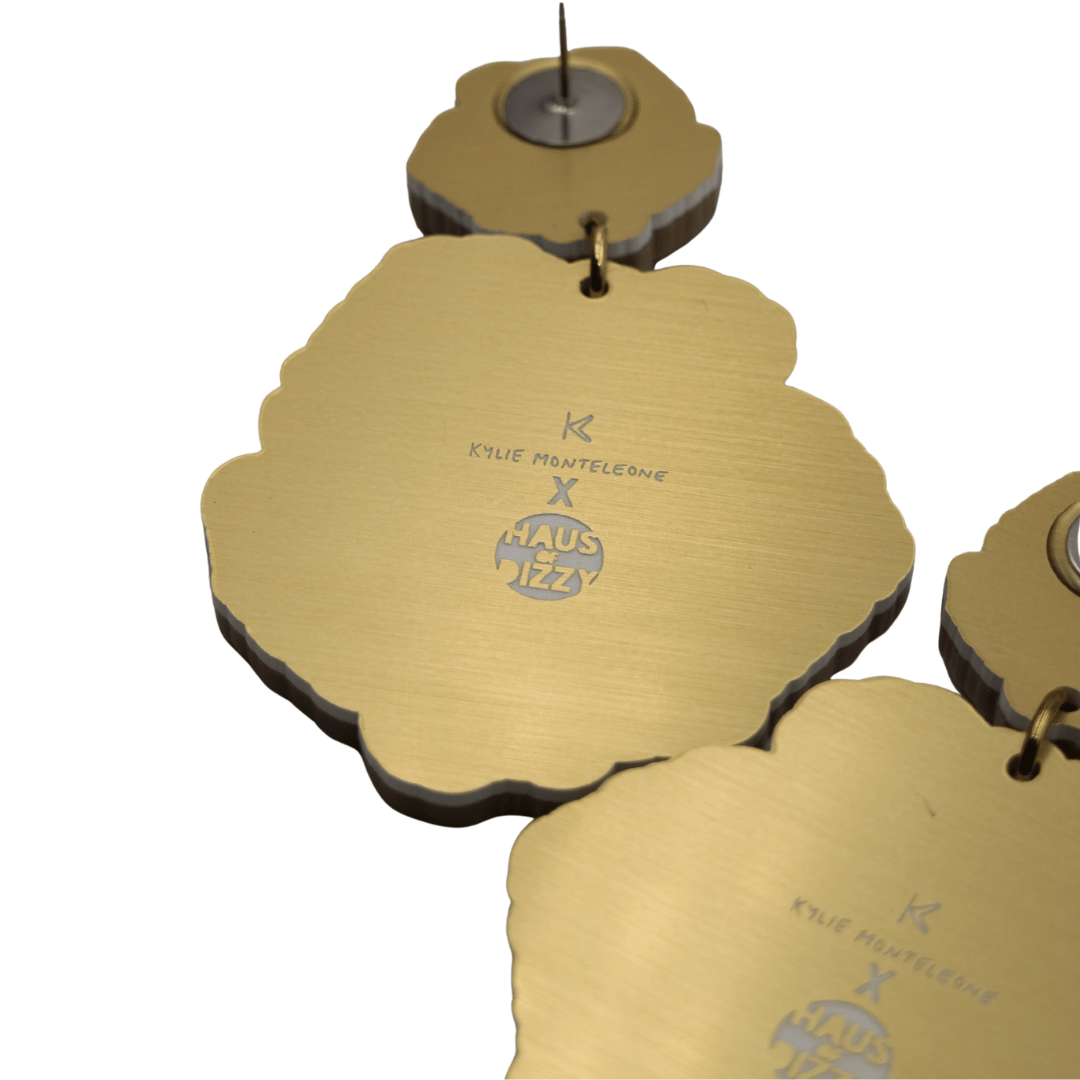 haus of dizzy x kylie monteleone collaboration desert rose earrings back view featuring custom etched design of artists' logos