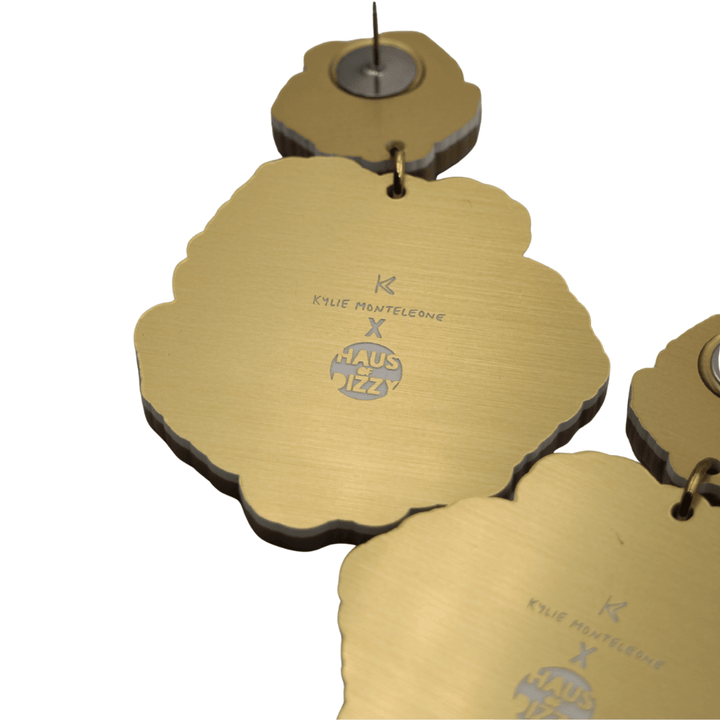 haus of dizzy x kylie monteleone collaboration desert rose earrings back view featuring custom etched design of artists' logos