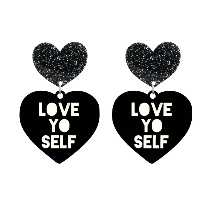 haus of dizzy black Heart-shaped earrings with 'LOVE YO SELF' text in white and black glittery hearts tops size large