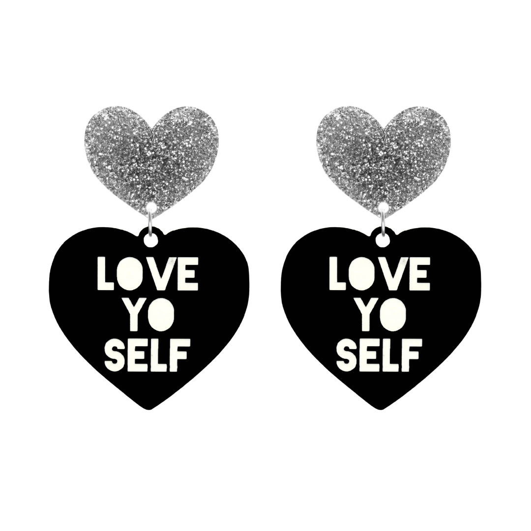 haus of dizzy black Heart-shaped earrings with 'LOVE YO SELF' text in white and silver glittery hearts tops size large