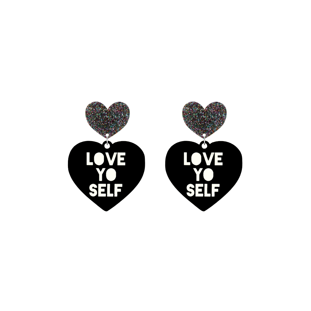 haus of dizzy black Heart-shaped earrings with 'LOVE YO SELF' text in white and multi coloured glittery hearts tops size small