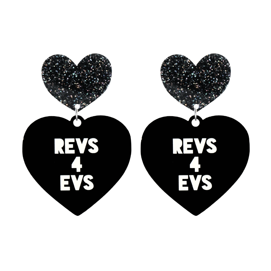 haus of dizzy custom black heart-shaped earrings this example has 'REVS 4 EVS' text in white over 3 lines with black glittery hearts tops in size large