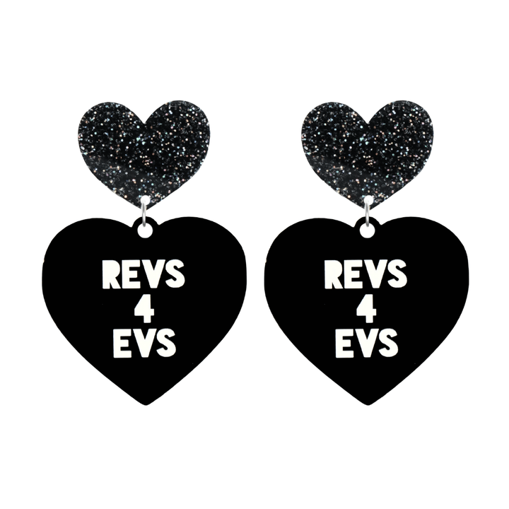 haus of dizzy custom black heart-shaped earrings this example has 'REVS 4 EVS' text in white over 3 lines with black glittery hearts tops in size large