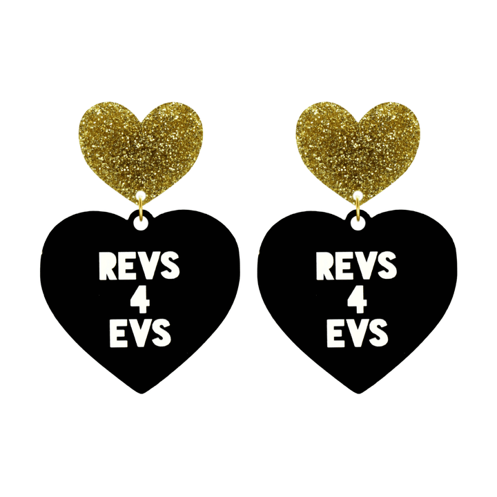 haus of dizzy custom black heart-shaped earrings this example has 'REVS 4 EVS' text in white over 3 lines with gold glittery hearts tops in size large