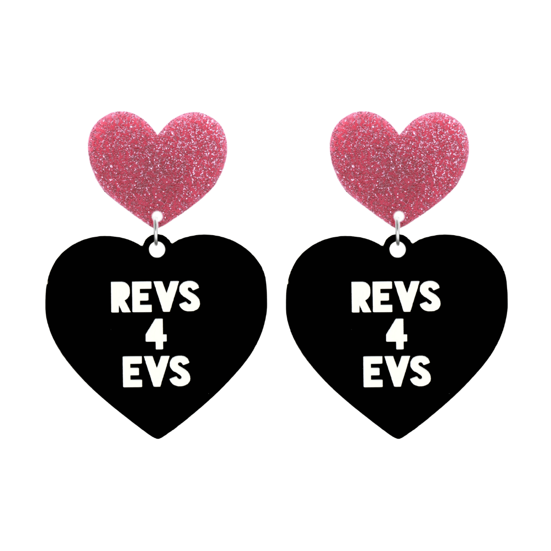 haus of dizzy custom black heart-shaped earrings this example has 'REVS 4 EVS' text in white over 3 lines with pink glittery hearts tops in size large