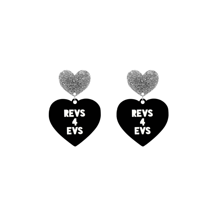haus of dizzy custom black heart-shaped earrings this example has 'REVS 4 EVS' text in white over 3 lines with silver glittery hearts tops in size small