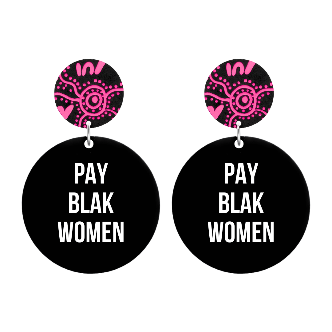 haus of dizzy black circle earrings with 'PAY BLAK WOMEN' in white text on black gloss acrylic body. stud tops have PAY pattern thats hand painted with hot pink acrylic paint pen