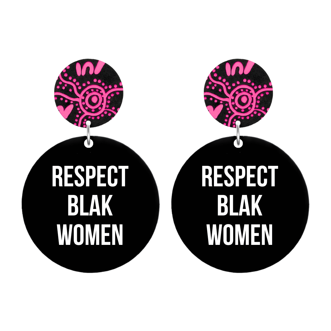 haus of dizzy black circle earrings with 'RESPECT BLAK WOMEN' in white text on black gloss acrylic body. stud tops have PAY pattern thats hand painted with hot pink acrylic paint pen