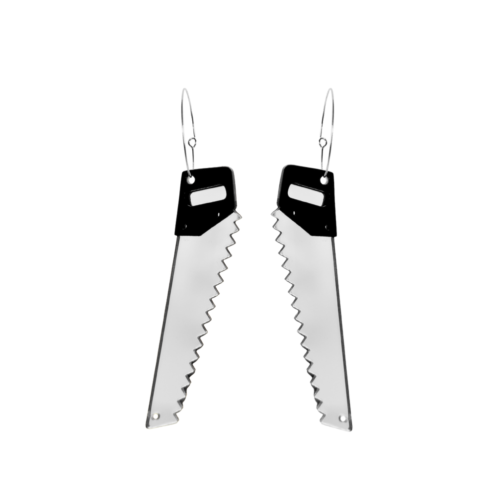 Haus of dizzy saw shaped earrings with black handles and silver blades on a white background