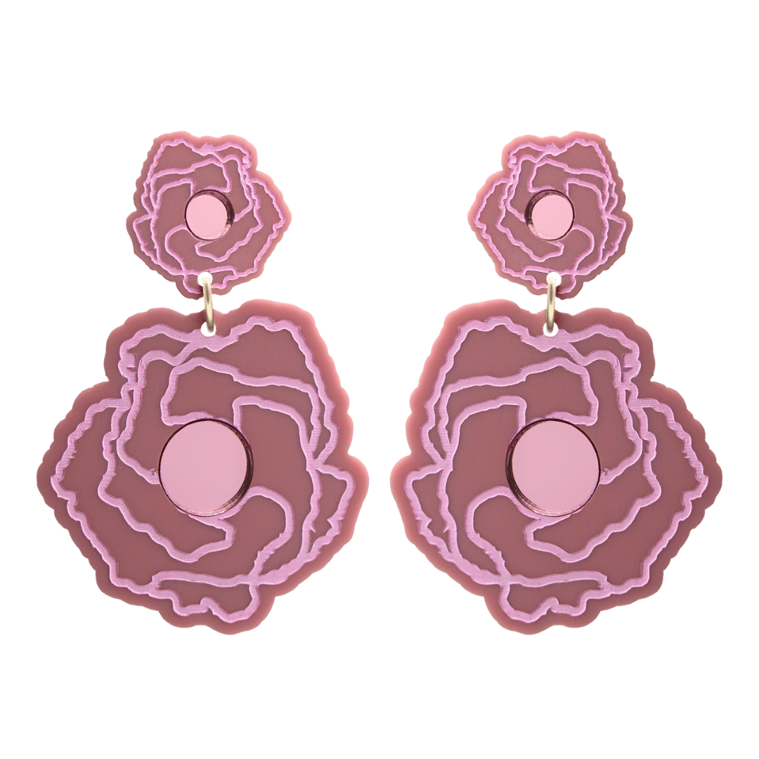 haus of dizzy x kylie monteleone collab earrings with aboriginal art that depicts the desert rose. using dusty rose matte acrylic and light pink hand painted details on flower with a pink mirror acrylic centre. he desert rose thrives in harsh conditions as do we. earrings come as studs only. 