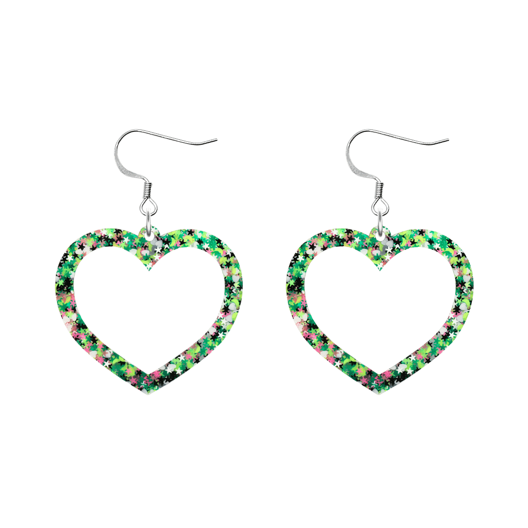 An image of haus of dizzy limited edition barbie heart earrings in colour jungle star. they are two layer heart-shaped earrings with multicolored glitter (greens, white, black, and pink) size small with hooks no heart tops 