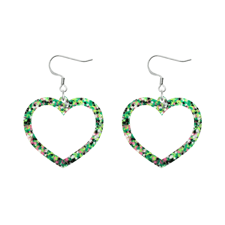 An image of haus of dizzy limited edition barbie heart earrings in colour jungle star. they are two layer heart-shaped earrings with multicolored glitter (greens, white, black, and pink) size small with hooks no heart tops 