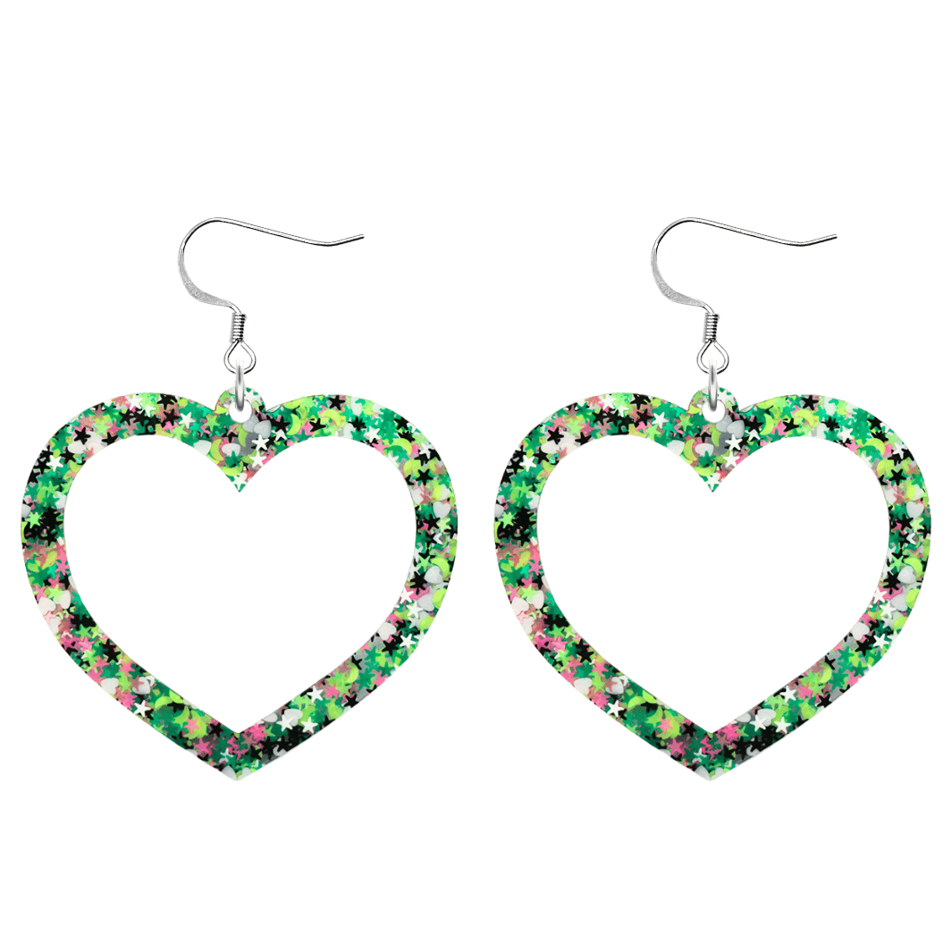An image of haus of dizzy limited edition barbie heart earrings in colour jungle star. they are two layer heart-shaped earrings with multicolored glitter (greens, white, black, and pink) size large with hooks no heart tops