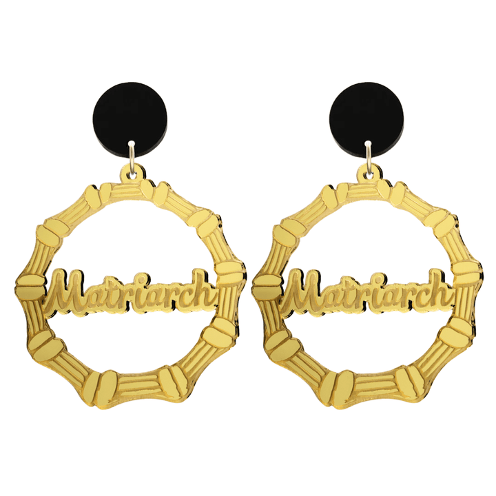 haus of dizzy acrylic gold mirror bamboo hoops with cursive text that reads matriarch with black circle stud tops size large