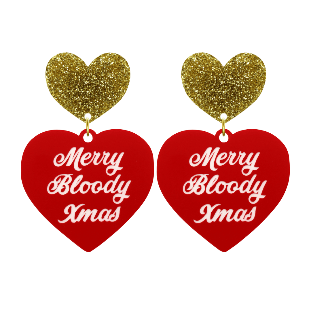 haus of dizzy red heart-shaped earrings with 'Merry Bloody Xmas' white text with gold glitter heart stud tops size large