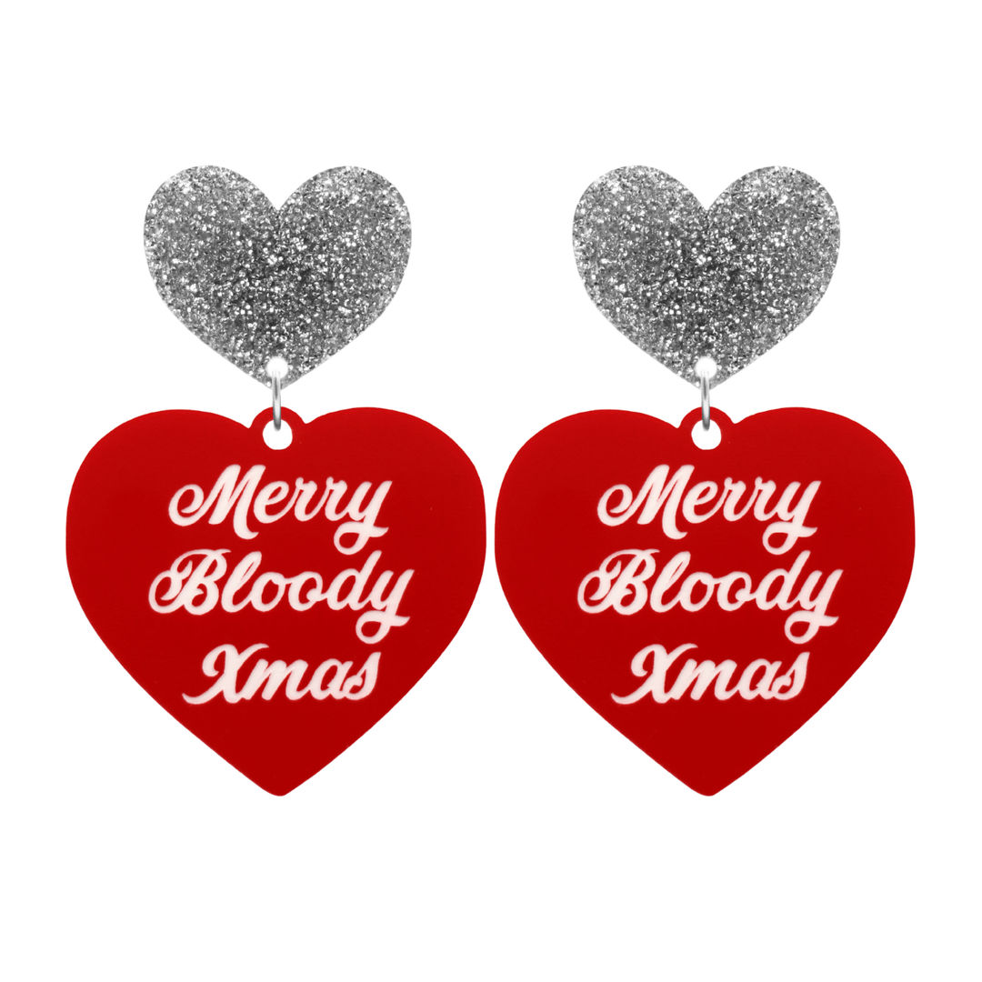 haus of dizzy red heart-shaped earrings with 'Merry Bloody Xmas' white text with silver glitter heart stud tops size large