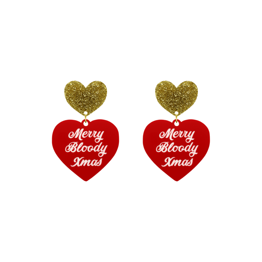 haus of dizzy red heart-shaped earrings with 'Merry Bloody Xmas' white text with gold glitter heart stud tops size small