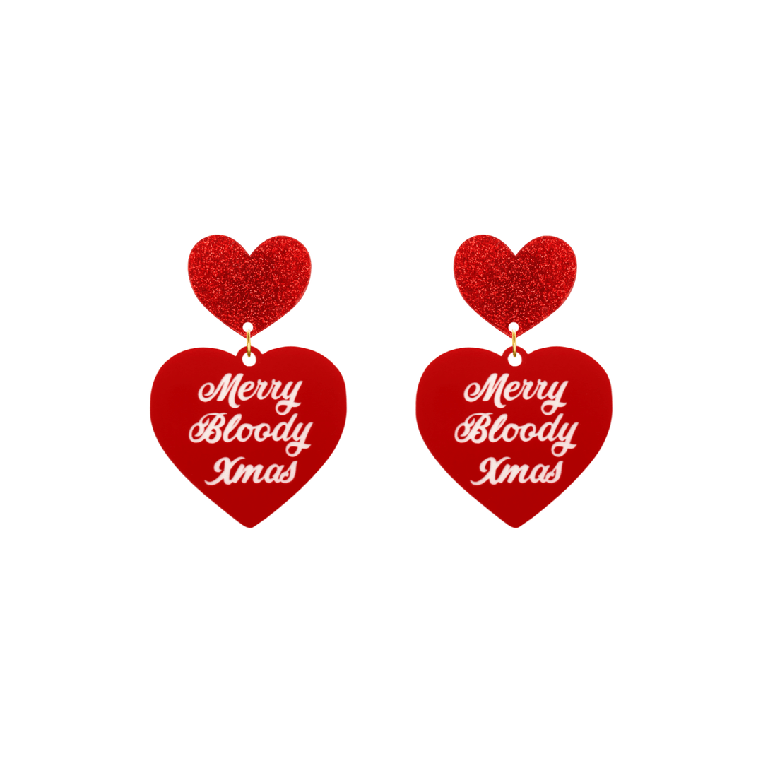 haus of dizzy red heart-shaped earrings with 'Merry Bloody Xmas' white text with red glitter heart stud tops size small