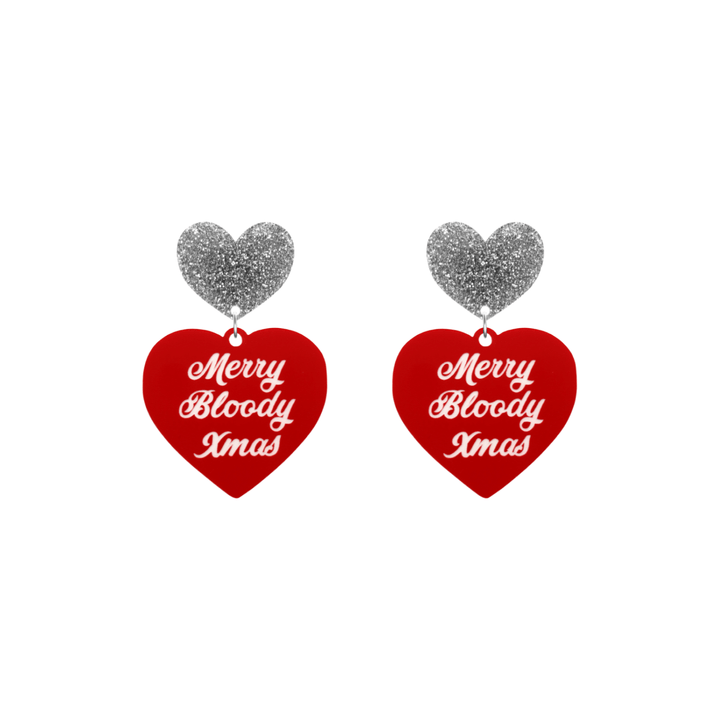 haus of dizzy red heart-shaped earrings with 'Merry Bloody Xmas' white text with silver glitter heart stud tops size small