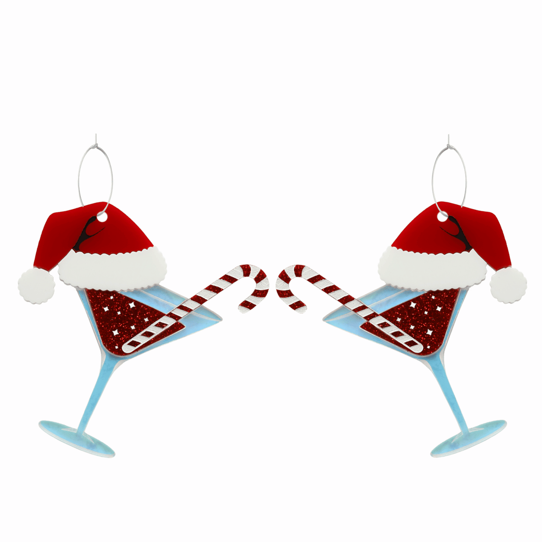 haus of dizzy merry martini earrings with Iridescent glass, red glitter inner and candy cane with hand-painted white detailing, red/white gloss santa hat with hand-painted black detailing. on silver hoops. 