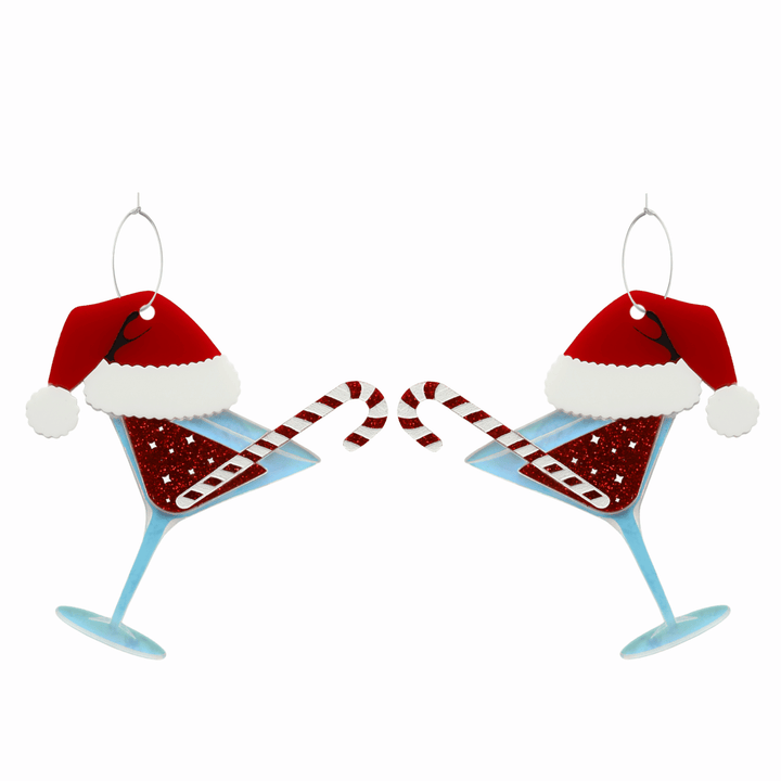 haus of dizzy merry martini earrings with Iridescent glass, red glitter inner and candy cane with hand-painted white detailing, red/white gloss santa hat with hand-painted black detailing. on silver hoops. 