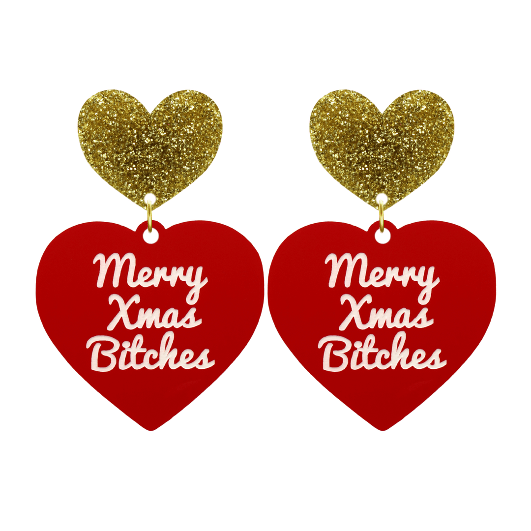 haus of dizzy red heart-shaped earrings with ‘Merry Xmas Bitches' white text with gold glitter heart stud tops size large