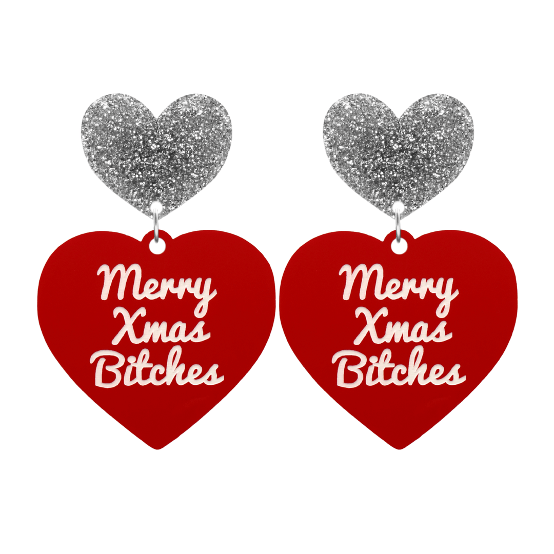 haus of dizzy red heart-shaped earrings with ‘Merry Xmas Bitches' white text with silver glitter heart stud tops size large