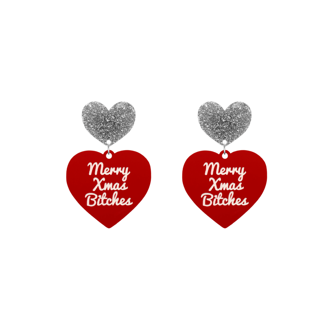 haus of dizzy red heart-shaped earrings with ‘Merry Xmas Bitches' white text with silver glitter heart stud tops size small