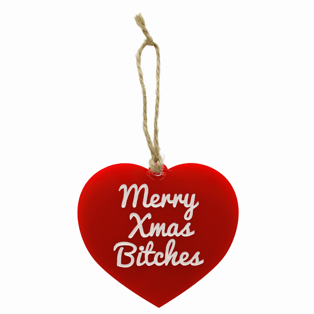 haus of dizzy merry xmas bitches red gloss heart ornament hung on twine one size