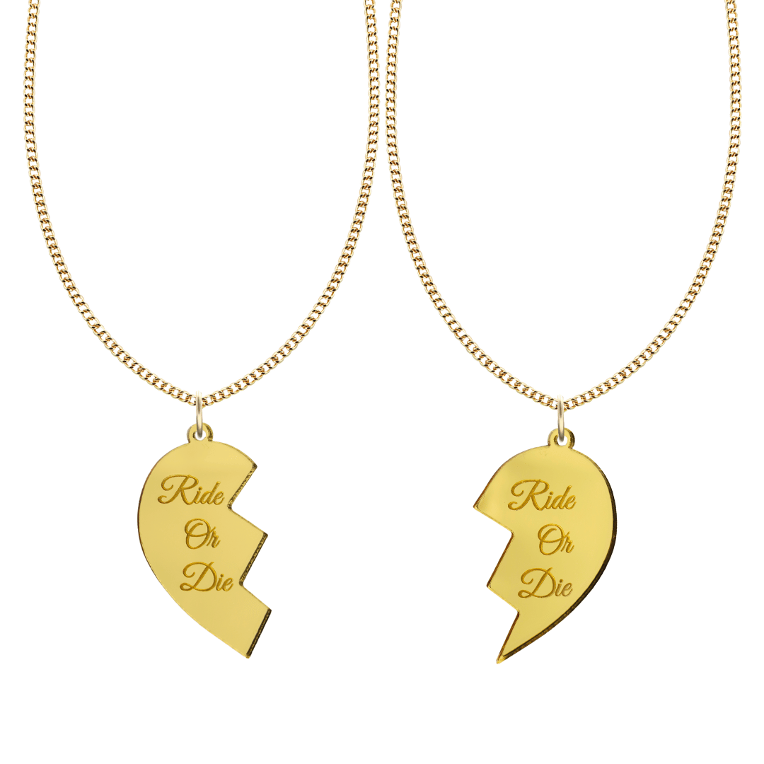 haus of dizzy set of two friendship acrylic gold mirror necklaces in the shape of a heart broken in two with cursive text that reads ride or die on both pieces of the heart