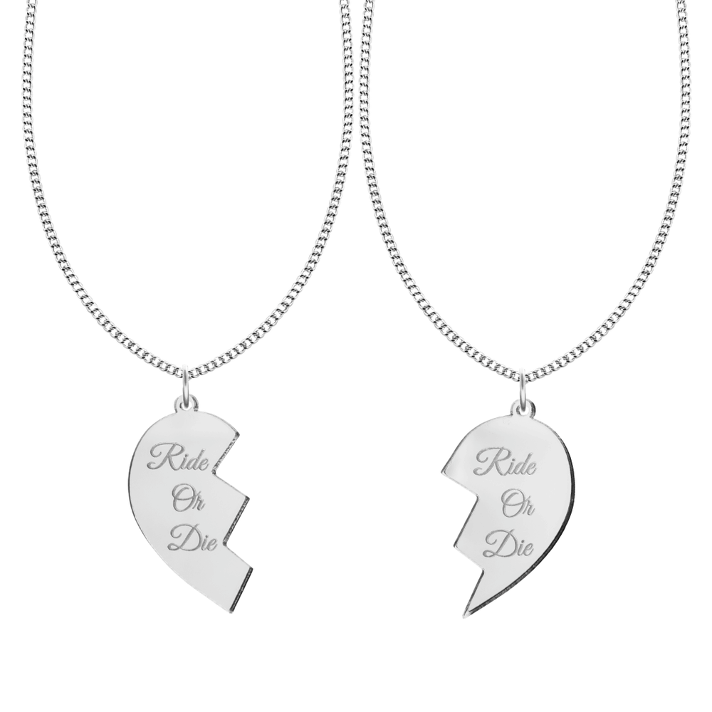 haus of dizzy set of two friendship acrylic silver mirror necklaces in the shape of a heart broken in two with cursive text that reads ride or die on both pieces of the heart