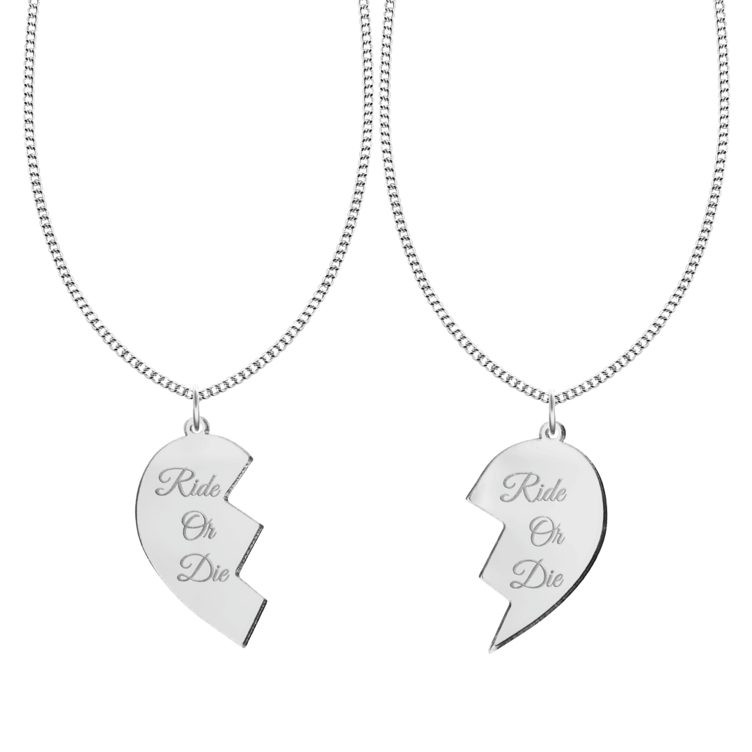 haus of dizzy set of two friendship acrylic silver mirror necklaces in the shape of a heart broken in two with cursive text that reads ride or die on both pieces of the heart