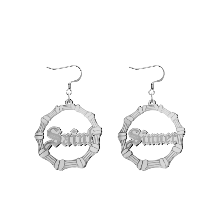 haus of dizzy saint sinner acrylic bamboo hoop earrings in a gothic Old English font, with one hoop reading “Saint” and the other “Sinner,” in a silver mirror acrylic with hooks no circle stud tops size small