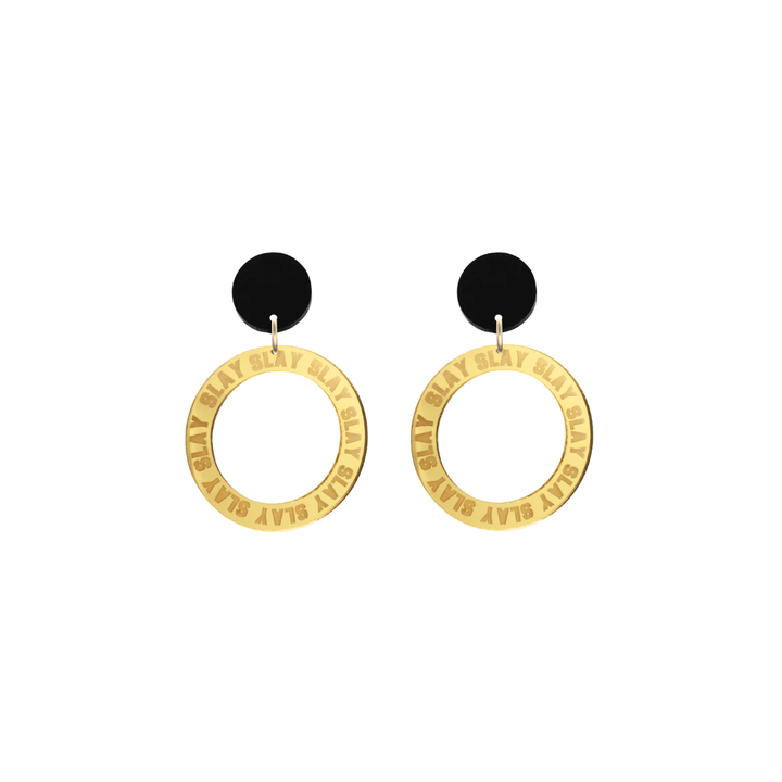 haus of dizzy mirror gold acrylic hoop earrings with repeated 'SLAY' etched text around the hoop size extra small with black circle tops